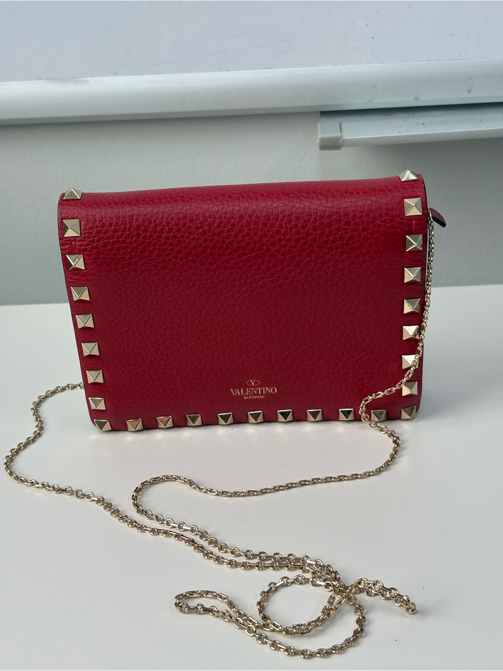 Valentino Garavani Pebbled Calfsin Leather Rockstud Crossbody Bag with Gold